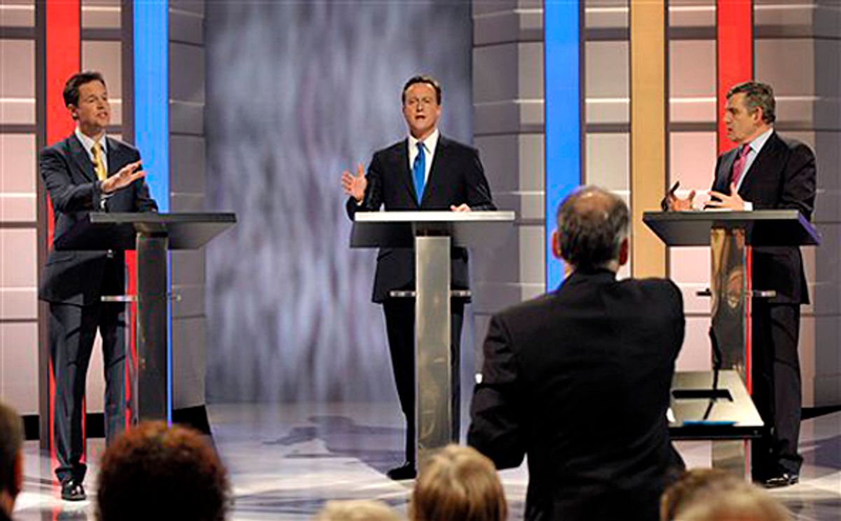 Britain's Labour party leader Gordon Brown, right, Nick Clegg of the Liberal Democrats, left, and Conservative leader David Cameron, center, during a first ever live televised political debate between party leaders broadcast to the nation, from TV studios in Manchester, England, Thursday April 15, 2010. Pollsters predict that about half of the British electorate, some 20 million people, plan to watch the televised debate between the leaders of the three main political parties Thursday, ahead of the British General Election on May 6, 2010.(AP Photo / Rob Evans) ** EDITORIAL USE ONLY - NOT TO BE RETAINED IN ARCHIVE AFTER MAY 14 2010 ** (Rob Evans)