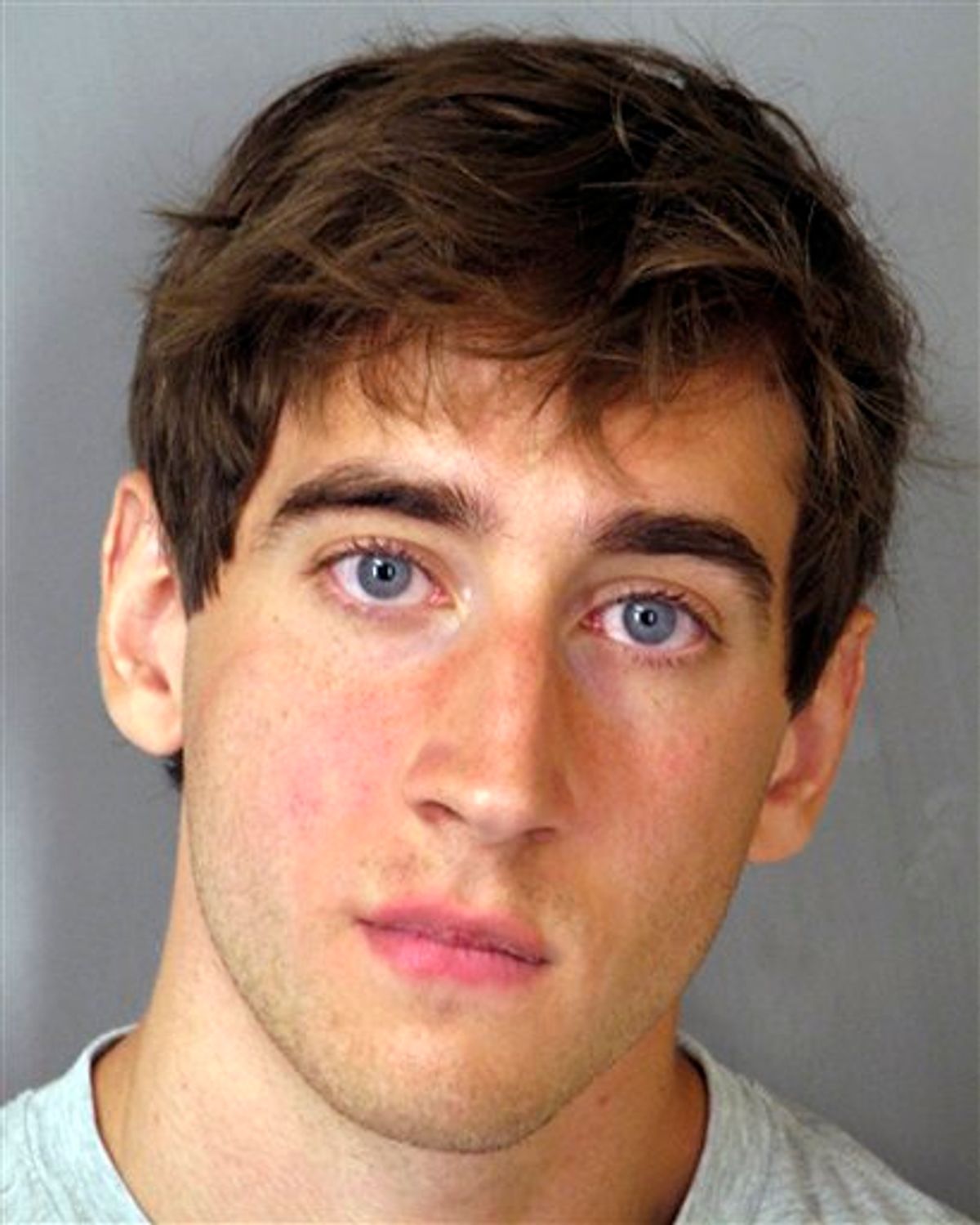 This May 10, 2010 Delaware State Police booking photo released by the Middlesex County, Mass., district attorney's office shows Adam Wheeler, of Deleware, indicted on identity fraud, larceny and falsifying documents from several prestigious schools including Harvard University and Massachusetts Institute of Technology. (AP Photo/Delaware State Police) (AP)