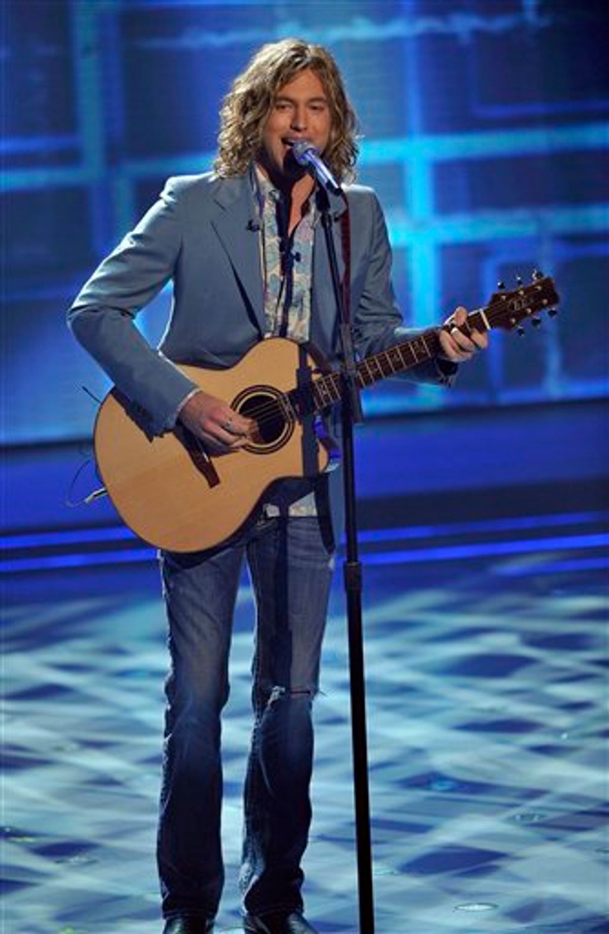 In this publicity image released by Fox, contestant Casey James performs on the singing competition series, "American Idol," on Tuesday, May 18, 2010, in Los Angeles. (AP Photo/Fox, Michael Becker) (AP)