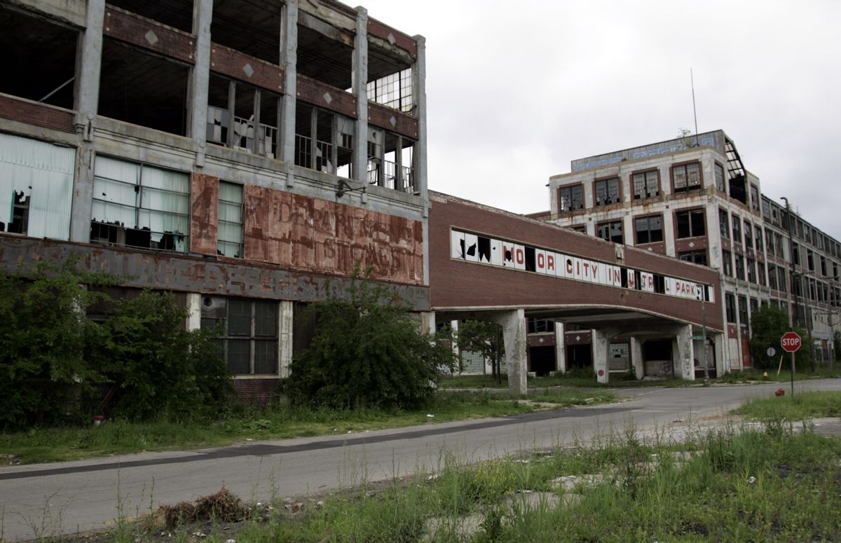 The abandoned and decaying Packard Motor Car Manufacturing plant, built in 1907 and designed by Albert Kahn, is seen near downtown Detroit, Michigan June 21, 2009. As communities from Buffalo to Milwaukee struggle with shuttered factories and vacant neighborhoods, some have turned abandoned properties into parks, gardens and other open space, even going so far as to plow under entire neighborhoods. In Flint, Michigan, the birthplace of General Motors, a pioneering program that allows local government to capture profits from tax foreclosures has generated funds to demolish over 1,000 abandoned homes in the past five years. Picture taken June 21.   REUTERS/Rebecca Cook (UNITED STATES TRANSPORT BUSINESS EMPLOYMENT)  (Reuters)