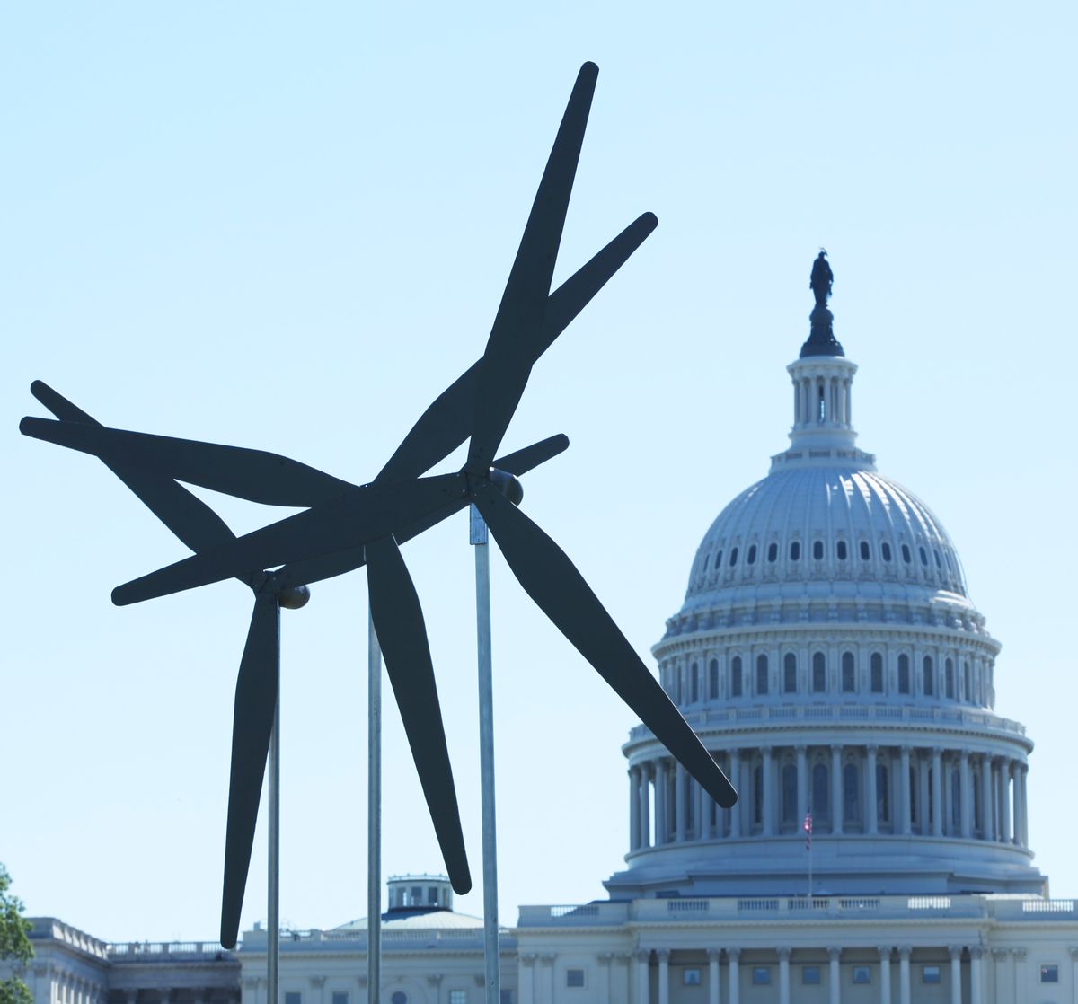 Windmills replicas to symbolize clean energy, erected by Greenpeace are seen near the Capitol in Washington, Wednesday, May 5, 2010,  to protest the oil spill in the Gulf and call on President Barack Obama and the Congress to stop plans for any new offshore drilling.   (AP Photo/Manuel Balce Ceneta)  (Associated Press)