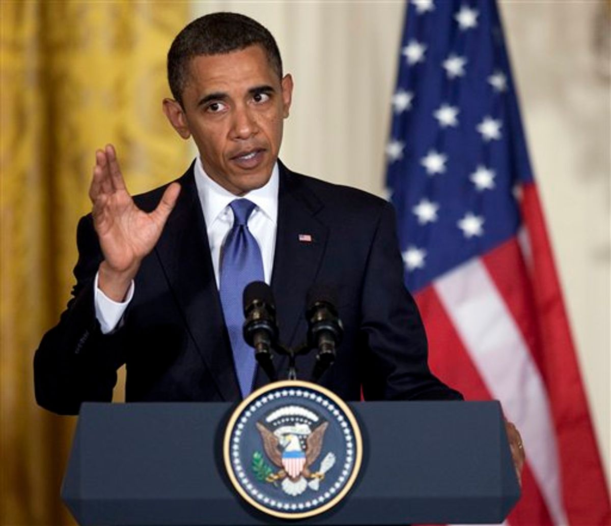 President Barack Obama gestures during a news conference with Afghanistan's President Hamid Karzai in the East Room of the White House on Wednesday, May  12, 2010 in Washington. (AP Photo/Evan Vucci)    (AP)