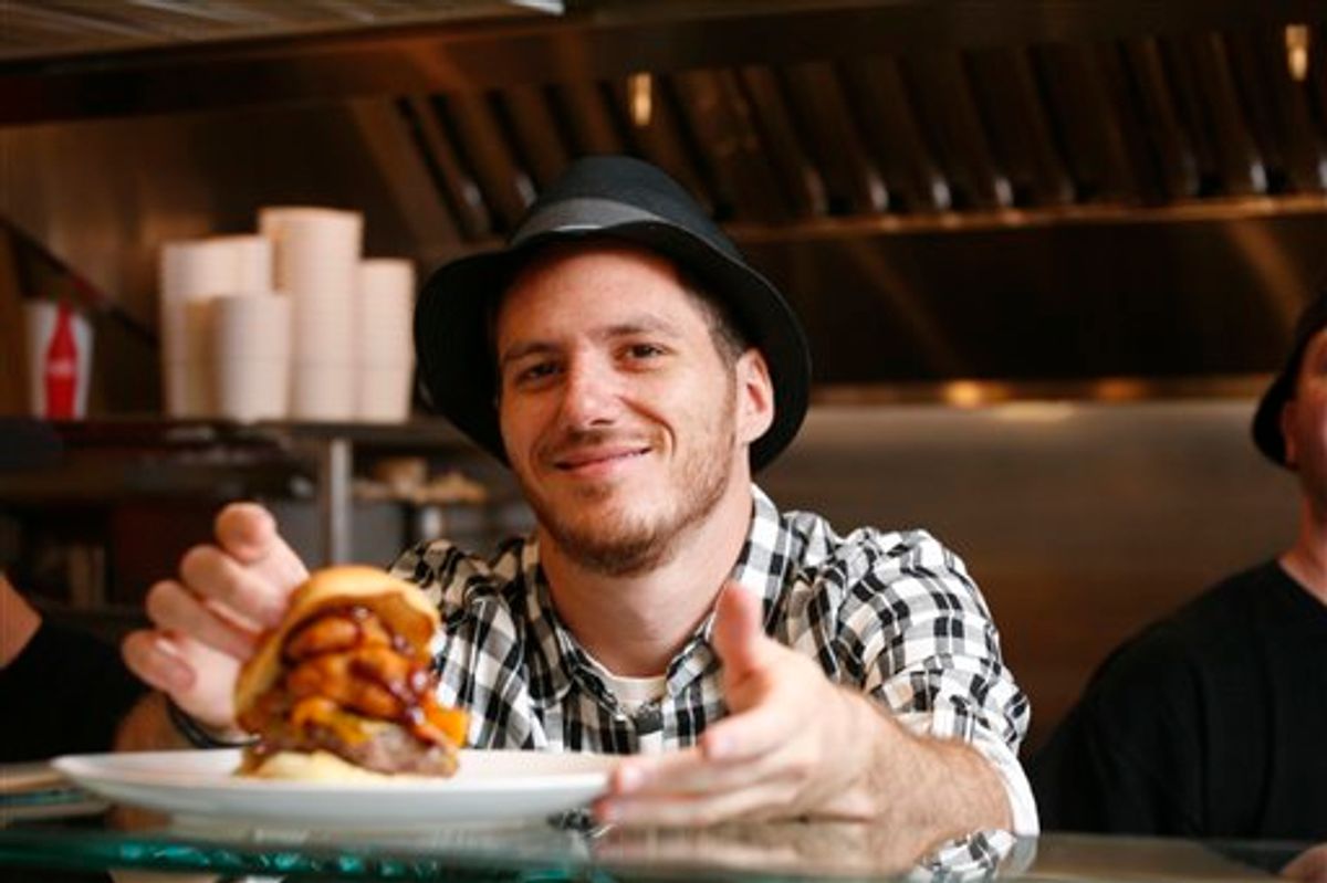 This undated photo provided by Joe Shymanski for Good Stuff Eatery shows chef Spike Mendelsohn at Good Stuff Eatery in Washington.  Mendelsohn's Washington burger joint, Good Stuff Eatery, has become a hotspot.    (AP Photo/Good Stuff Eatery, Joe Shymanski)  NO SALES  (AP)