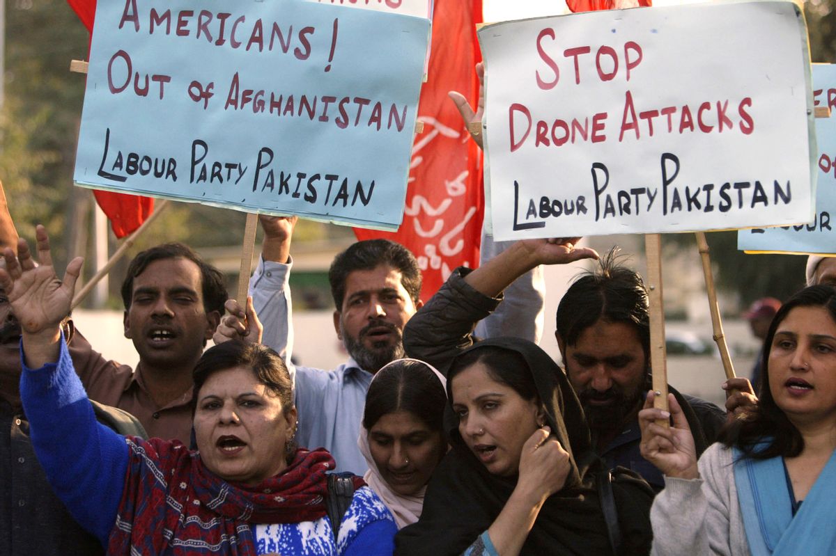 Supporters of Pakistani Labour Party rally against United States and condemned drone attacks on militants in Pakistani tribal areas along the Afghanistan border, Friday, Dec. 4, 2009 in Lahore, Pakistan. (AP Photo/K.M.Chaudary) (K.m.chaudary)