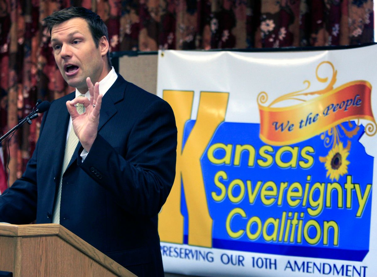 Law professor and Secretary of State candidate Kris Kobach, speaks at a rally in support of the 10th amendment Friday, Jan. 15, 2010, in Topeka, Kan. The Kansas Sovereignty Coalition and the Coalition of Citizen Advocacy Groups held the rally in a meeting house near the capitol. (AP Photo/Orlin Wagner) (Orlin Wagner)