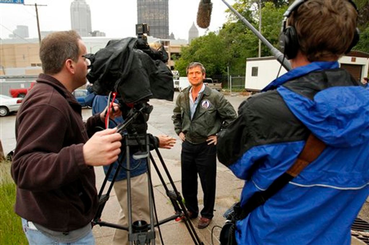 ** ADDS INFORMATION ON TUESDAY'S PRIMARY ** U.S. Rep. Joe Sestak, D-Pa, center, is interviewed outside the Consol Energy Center construction site in downtown Pittsburgh, Monday, May 17, 2010. Sestak is in a close race in Tuesday's Democratic primary with Sen. Arlen Specter. (AP Photo/Gene J. Puskar) (AP)