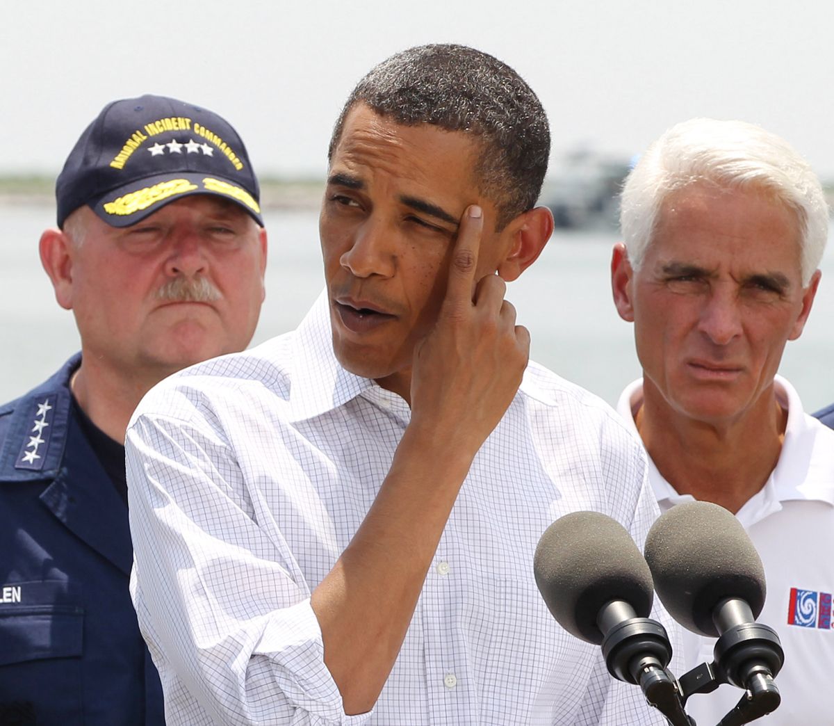 U.S. President Barack Obama speaks after a briefing on the damage along the Louisiana coastline caused after a BP oil line ruptured in the Gulf of Mexico, May 28, 2010. (From L-R) National Incident Commander U.S. Coast Guard Adm. Thad Allen , Obama, and Florida Gov. Charlie Crist.  REUTERS/Larry Downing  (UNITED STATES - Tags: POLITICS)     (Â© Larry Downing / Reuters)