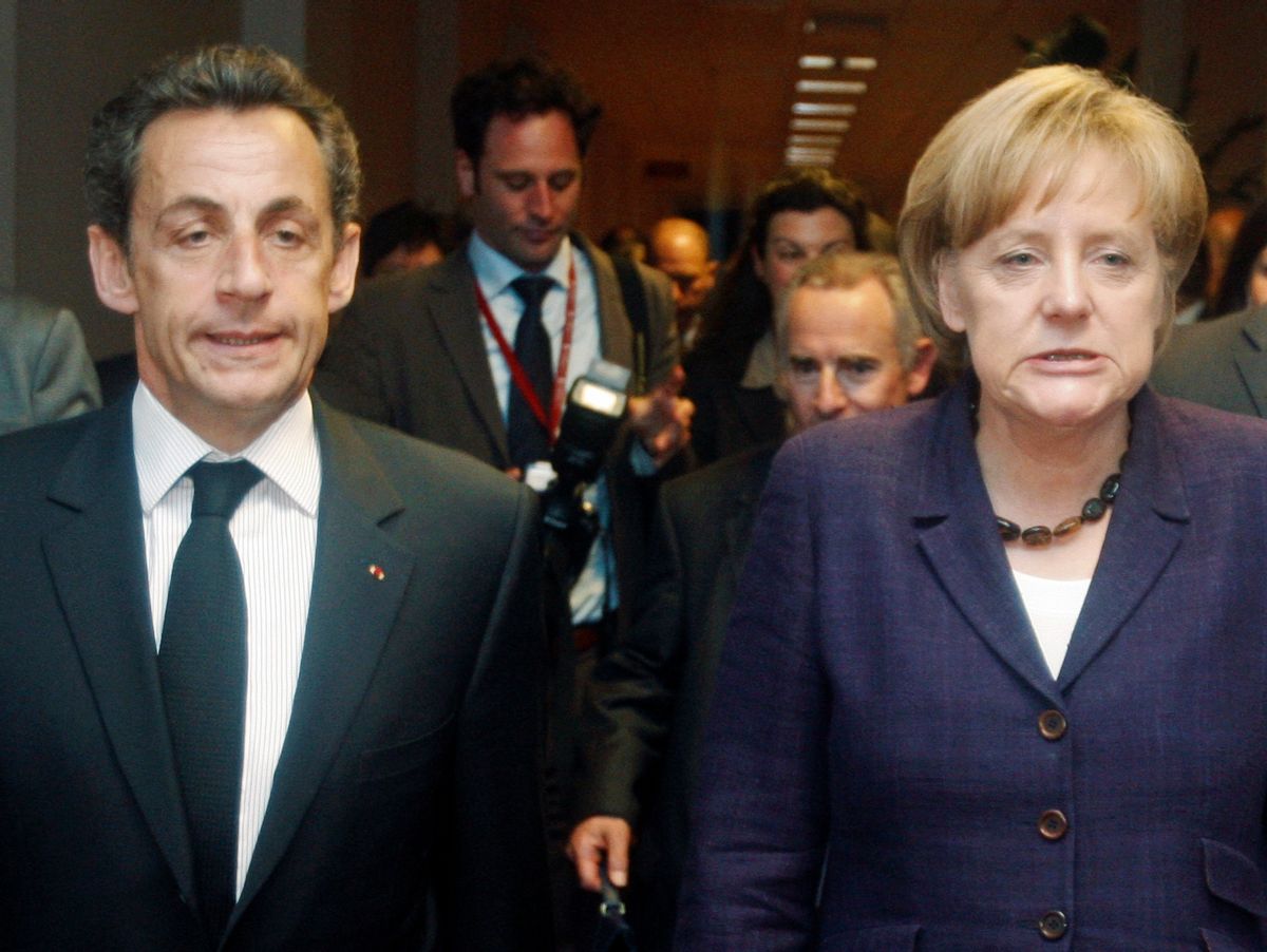 France's President Nicolas Sarkozy (L) and Germany's Chancellor Angela Merkel (R) walk together during a Euro Zone leaders summit in Brussels, May 7, 2010. Euro zone leaders agreed on Friday that they would have special measures ready before financial markets open on Monday to prevent financial turmoil in Greece spreading to other countries such as Spain and Portugal. Photo taken May 7, 2010.  REUTERS/Michel Euler/Pool  (BELGIUM - Tags: POLITICS BUSINESS IMAGES OF THE DAY)    (Reuters)