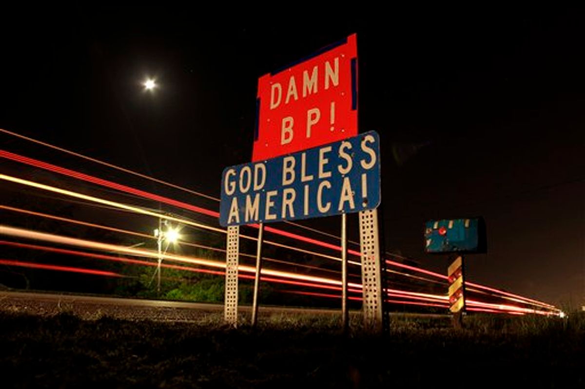 A sign chastising BP is seen along a highway south of Belle Chasse, La. Thursday, May 20, 2010. One month after the BP's Deepwater Horizon oil rig explosion, oil continues to leak into the Gulf of Mexico and has begun washing onto Louisiana coastline. (AP Photo/Charlie Riedel) (AP)
