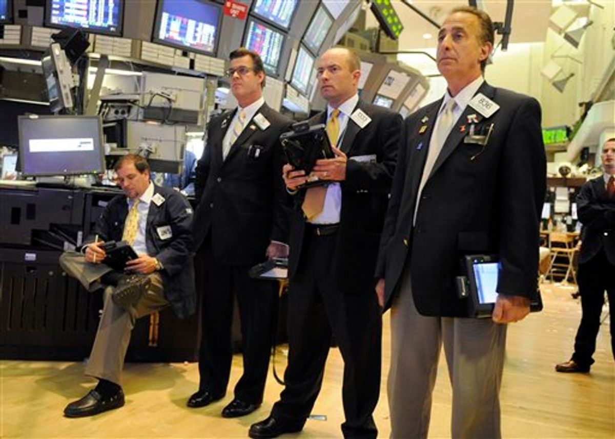 Traders gather on the floor of the New York Stock Exchange to watch one of the electronic boards that showed a steep decline in the markets, Thursday, May 6, 2010, in New York. (AP Photo/Henny Ray Abrams) (AP)