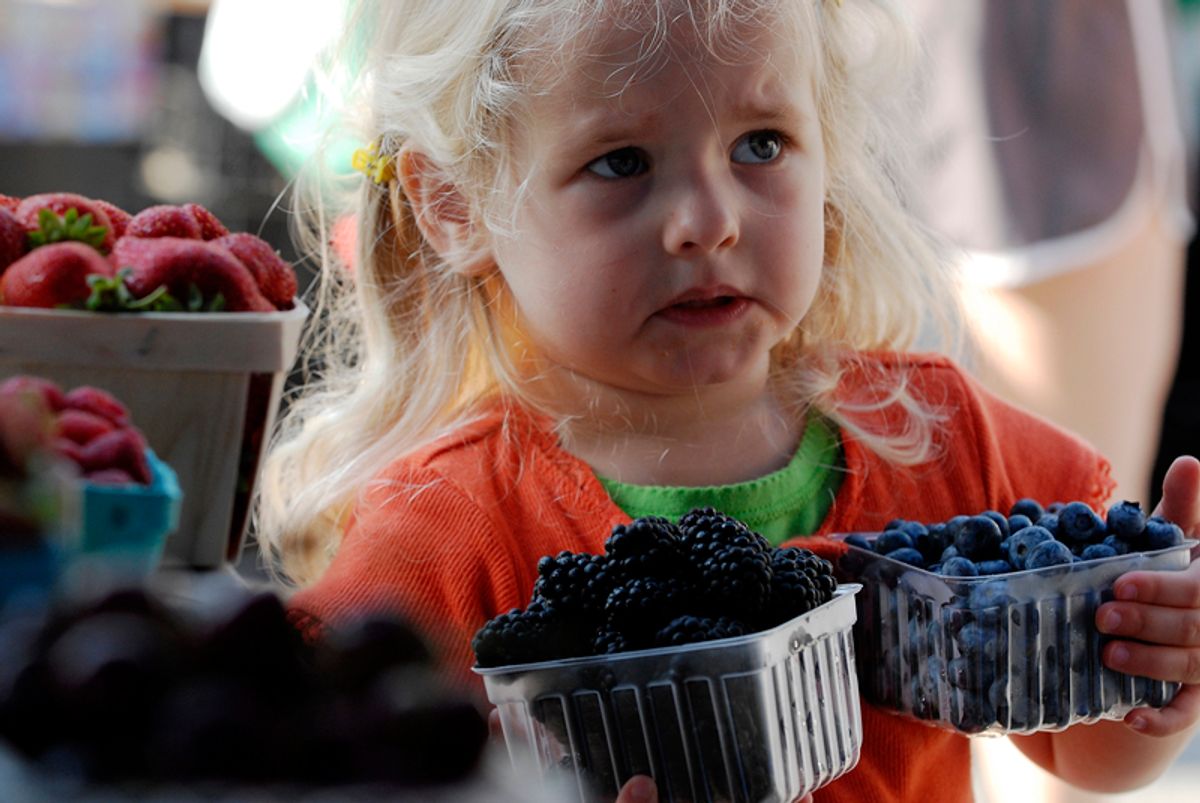 Elena Green, 3, helps her mother buy berries at the Westmoreland Berry Farm stand at the Arlington Farmers' Market in Arlington, Virginia in this picture taken June 28, 2008. While price hikes are rippling through farmers' markets across the United States, they are doing little to deter shoppers looking for local produce. Picture taken June 28. REUTERS/Jonathan Ernst   (UNITED STATES)  To match feature FOOD-USA/FARMERSMARKET  (Â© Jonathan Ernst / Reuters)