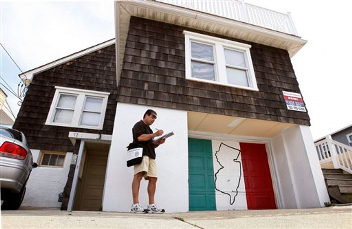 U.S. Census worker Gary Caporale, of Ortley Beach, N.J. tries to find someone living at the house made famous by the cast of the "Jersey Shore" television show, Friday, May 21, 2010, in Seaside Heights, N.J. This year, the "Jersey Shore'' Jersey shore has become a destination in its own right as fans of the MTV reality series descend on the Garden State to experience the same sights, sounds and smells. (AP Photo/Mel Evans) (AP)