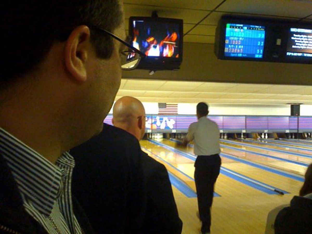 Salon's Mike Madden watches Barack Obama bowl, not very well, during a campaign stop in Altoona, Pa., during the 2008 presidential primary.