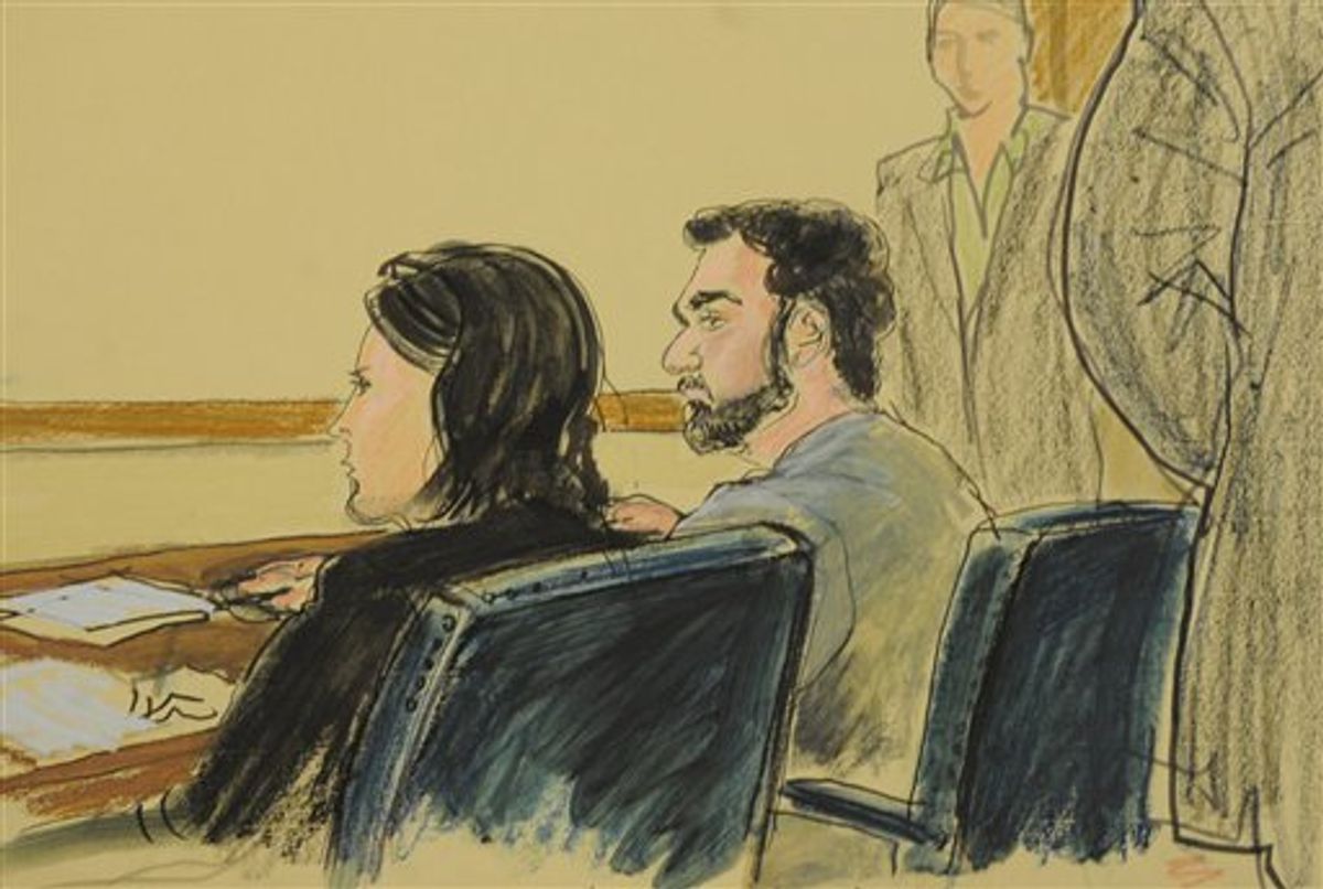 In this courtroom sketch, defendant Faisal Shahzad sits with assistant public defender Julia Gatto, left, during his arraignment in federal court in New York on Tuesday, May 18, 2010, in New York. The suspect in a botched car bombing in Times Square did not enter a plea to five felony charges against him. (AP Photo/Elizabeth Williams) (AP)