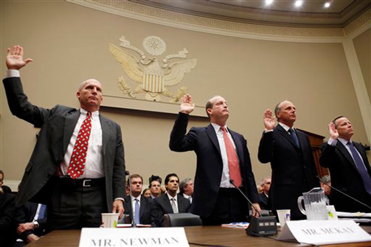 From left, Steven Newman, President and Chief Executive Officer Transocean Limited, Lamar McKay, President and Chairman of BP America, Inc., Timothy Probert, President, Global Business Lines, and Chief Health, Safety, and Environmental Officer, Halliburton, and Jack Moore, President and Chief Executive Officer, Cameron, are sworn in before they testify during a House subcommittee hearing on the Gulf Coast oil spill, Wednesday, May 12, 2010, on Capitol Hill in Washington. (AP Photo/Carolyn Kaster)  (Carolyn Kaster)
