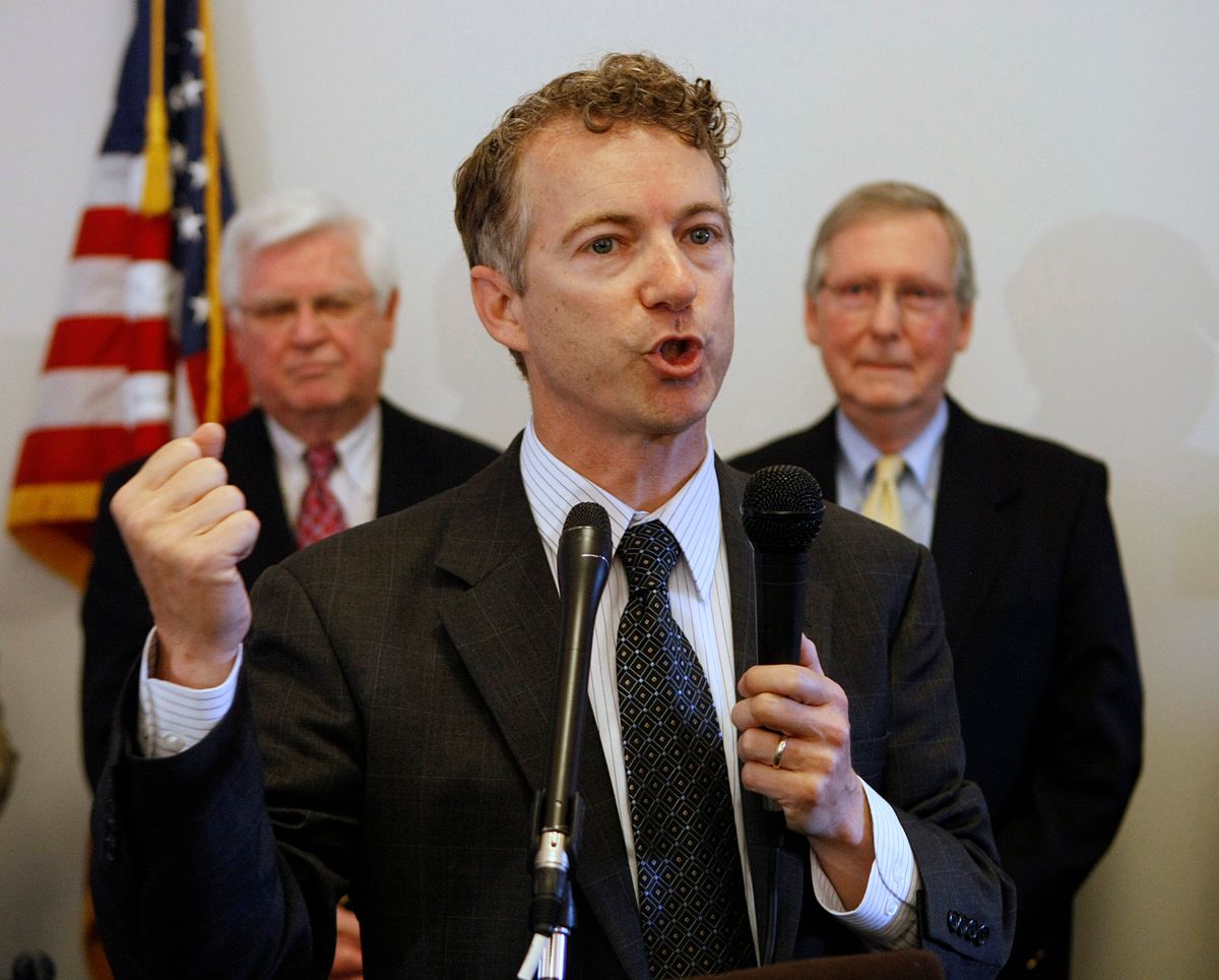 Republican U.S. Senate candidate Rand Paul speaks to supporters during a party unity rally in Frankfort, Ky., Saturday, May 22, 2010. U.S. Senate Minority Leader Mitch McConnell, right, and U.S. Rep. Hal Rogers look on in the background. (AP Photo/Ed Reinke)   (Ed Reinke)