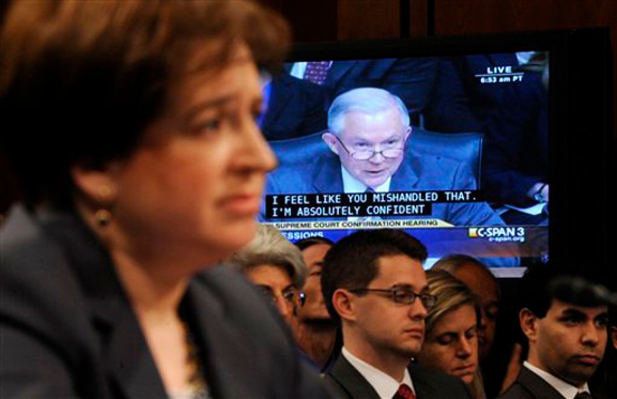 Supreme Court nominee Elena Kagan, foreground. listens to questions from Sen. Jeff Sessions, R-Ala., the ranking Republican on the Senate Judiciary Committee, on video screen, on Capitol Hill in Washington, Tuesday, June 29, 2010, during the committee's confirmation hearing for Kagan. (AP Photo/Susan Walsh) (Susan Walsh)