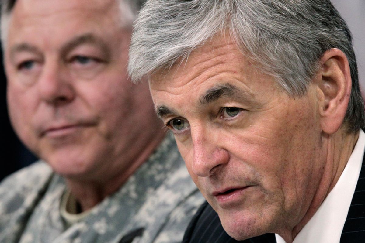 Army Secretary John McHugh, right, with Lt. Gen. R. Steven Whitcomb,  during a news conference on June 10.