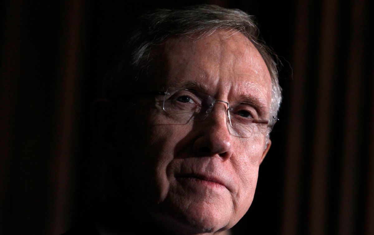 U.S. Senate Majority leader Harry Reid (D-NV) listens to remarks after the Senate approved a package of changes to President Barack Obama's landmark healthcare overhaul and sent the bill to the House of Representatives for final passage in Washington, March 25, 2010.   REUTERS/Jim Young   (UNITED STATES - Tags: POLITICS HEALTH)  (Â© Jim Young / Reuters)
