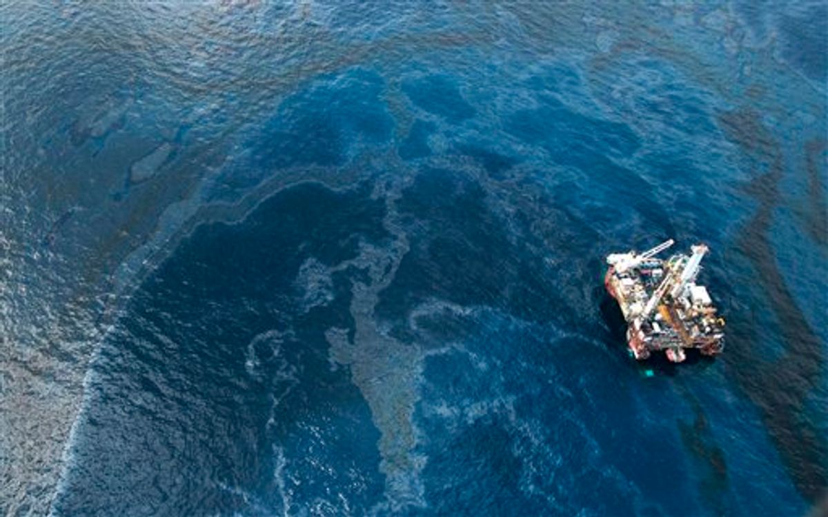 Oil surrounds the site of the Deepwater Horizon oil spill in the Gulf of Mexico near the coast of Louisiana, Monday, May 31, 2010. (AP Photo/Jae C. Hong) (AP)