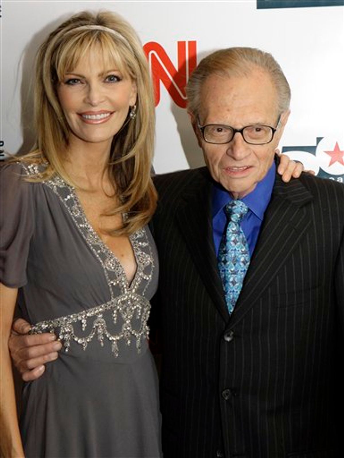 FILE - In this April 18, 2007 file photo, Larry King and his wife Shawn arrive to a party held by CNN celebrating King's fifty years of broadcasting, New York. ( AP Photo/Stuart Ramson, file) (AP)