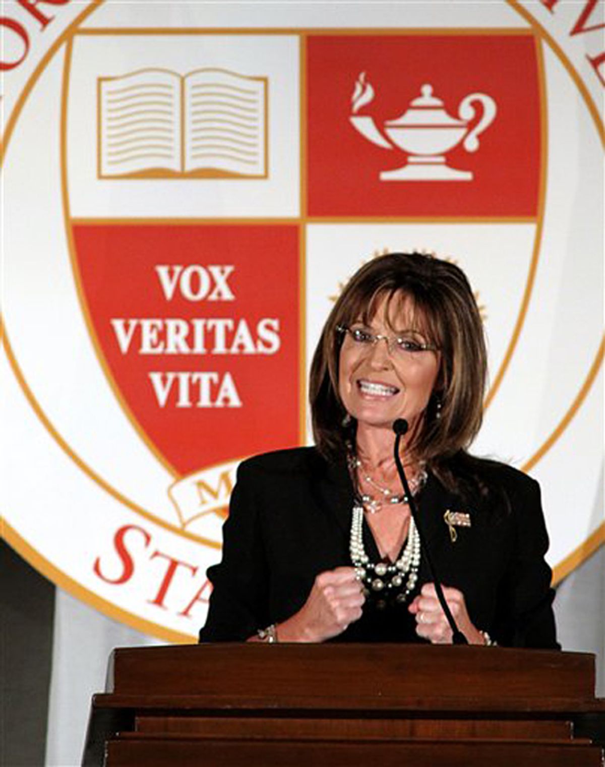 Former Republican vice presidential candidate Sarah Palin gestures during her speech at a fundraising dinner at California State University, Stanislaus in Turlock, Calif., Friday, June 25, 2010.  Palin's  speech has generated intense scrutiny since the nonprofit foundation holding the event first announced her visit in March.  University officials have refused to divulge the terms of her contract or her speaking fee.(AP Photo/Rich Pedroncelli) (Rich Pedroncelli)