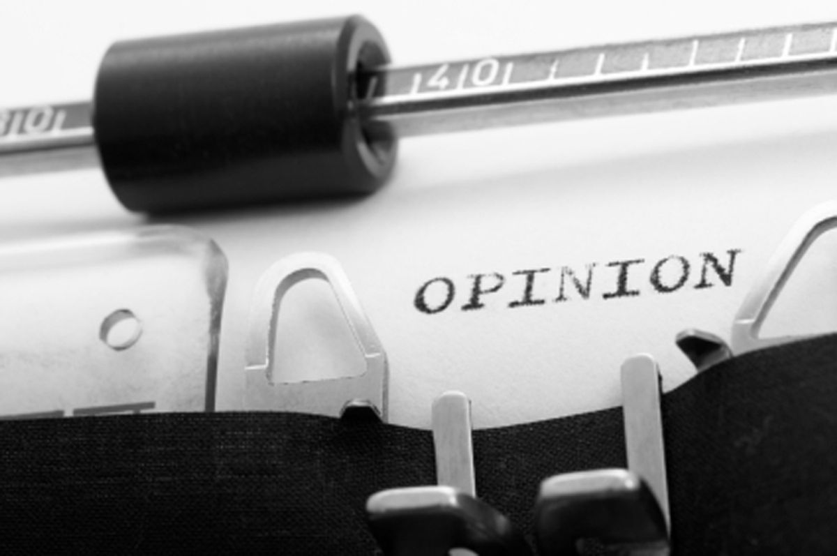 OPINION in old typewriter (José Luis Gutiérrez)