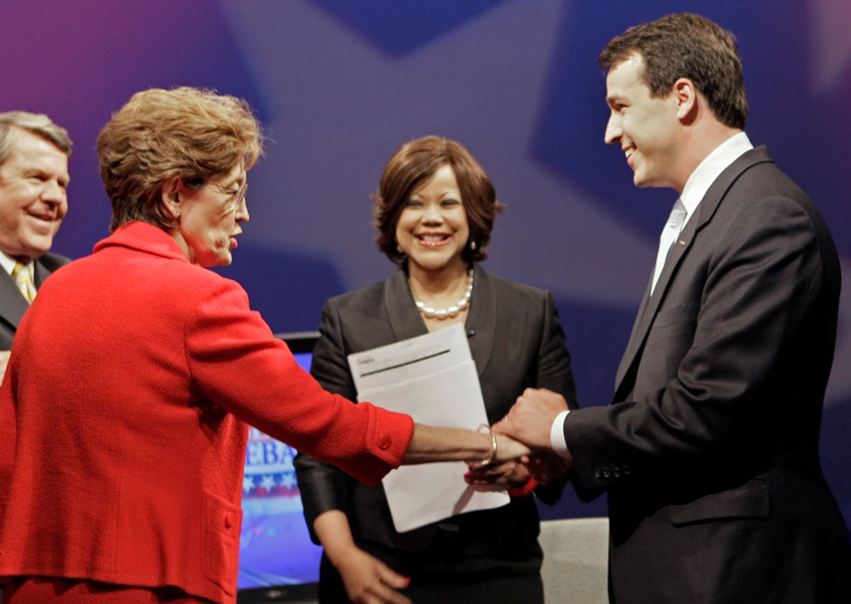 North Carolina Democratic U.S. Senate candidates Elaine Marshall, left, and Cal Cunningham greet each other prior to a televised debate at WRAL-TV in Raleigh, N.C., Thursday, June 10, 2010. Anchors Pam Saulsby, center, and David Crabtree, left, are moderators. (AP Photo/Gerry Broome)  (Gerry Broome)