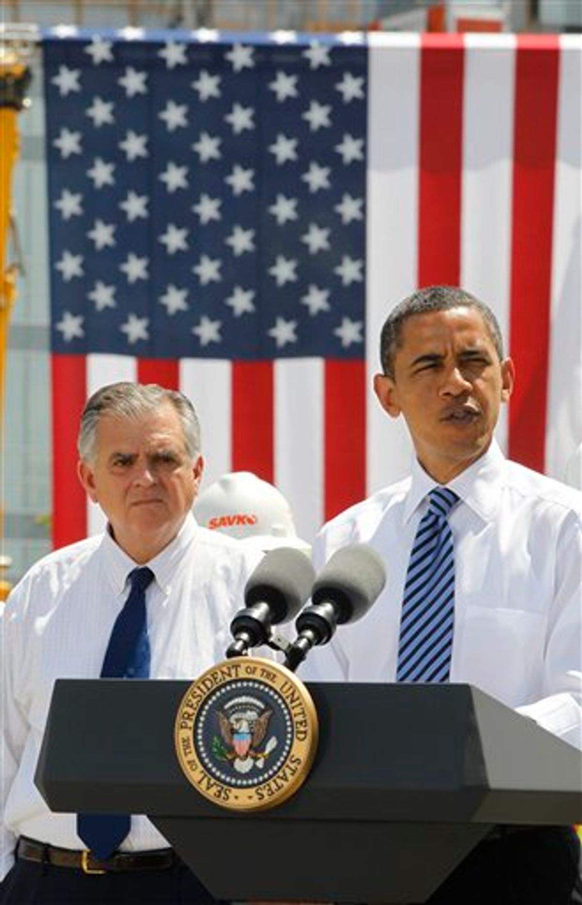 President Barack Obama, accompanied by Transportation Secretary Ray LaHood, speaks at a Recovery Act highway project in Columbus, Ohio, Friday, June 18, 2010. (AP Photo/Charles Dharapak) (AP)