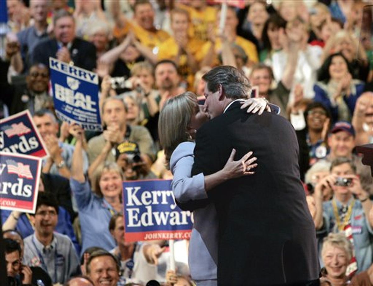 FILE - In this July 26, 2004 file photo, former Vice President Al Gore kisses his wife Tipper after addressing the delegates during the Democratic National Convention at the FleetCenter in Boston. Gore and his wife, Tipper, are separating after 40 years of marriage. (AP Photo/Kevork Djansezian, File) (AP)
