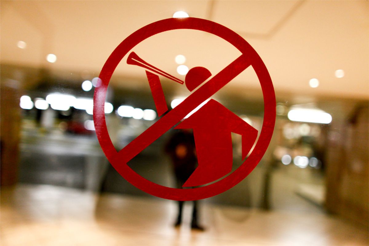 A sticker forbidding the blowing of vuvuzelas is seen on a door of a mall in downtown Bloemfontein, South Africa.