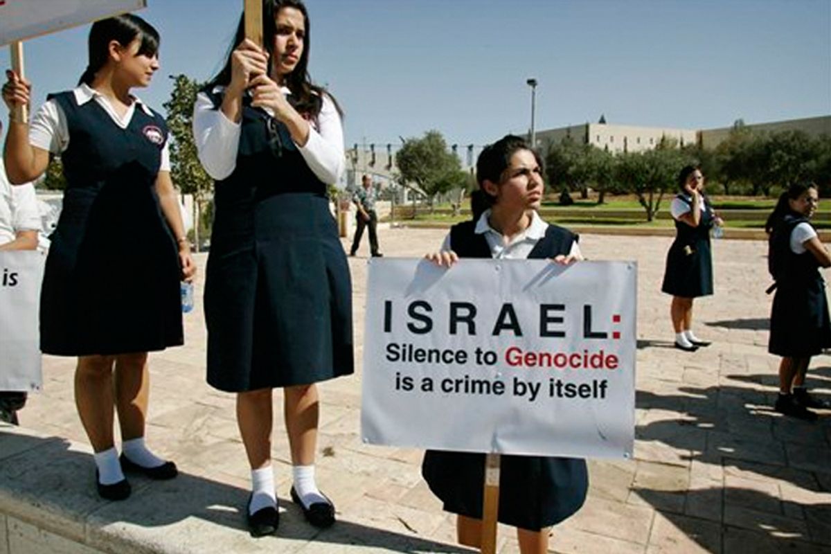 Armenian school girls hold signs as they demonstrate in front of the Israeli Foreign Ministry in Jerusalem in October, 2007.