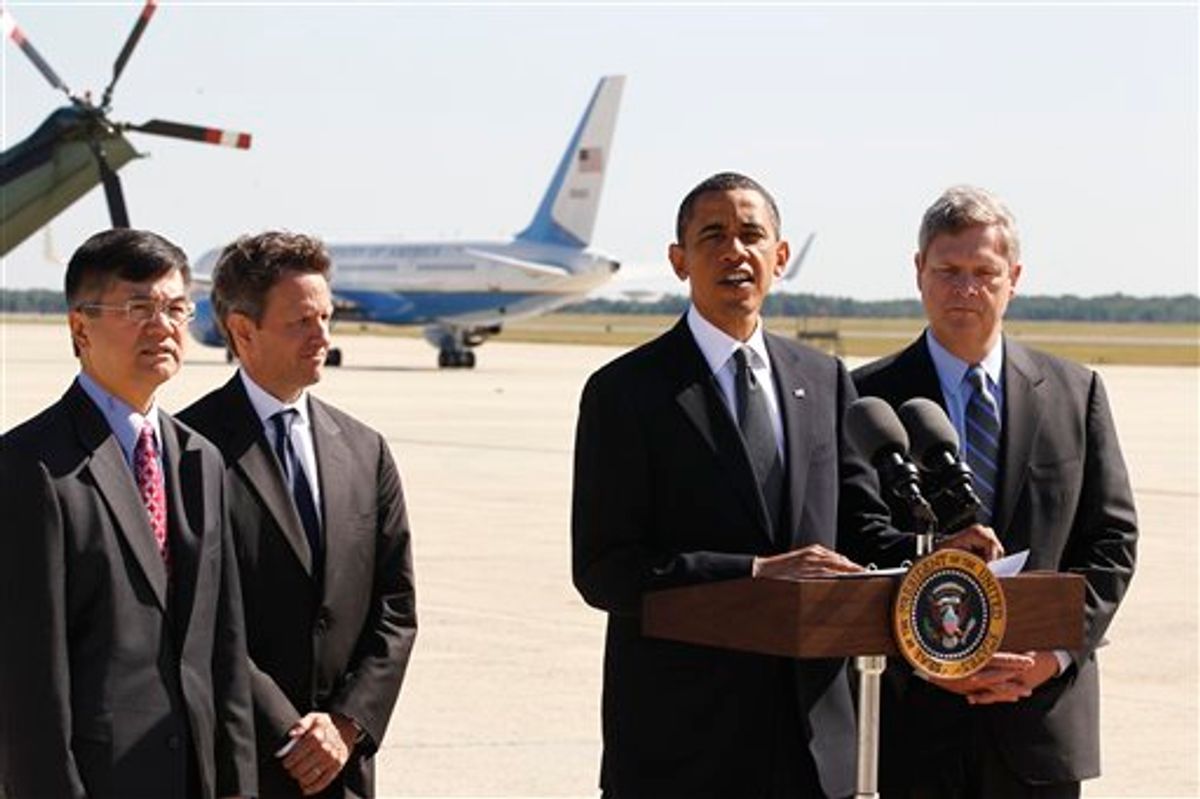 President Barack Obama makes a statement about the economy at Andrews Air Force Base, Md., Friday, July 2, 2010. Joining him, from left are, Commerce Secretary Gary Locke, Treasury Secretary Tim Geithner, and Agriculture Secretary Tom Vilsack.  (AP Photo/Charles Dharapak) (AP)