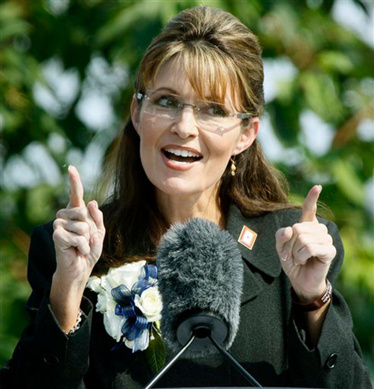 FILE - In this July 26, 2009 file photo shows Alaska Gov. Sarah Palin gestures while giving her resignation speech in Fairbanks, Alaska. A year after her abrupt resignation as Alaska governor, Palin has evolved into a political personality writ large, commanding weeks of headlines for a single Facebook observation _ see health care "death panels" _ and six-figure speaking fees from groups clamoring for her words. Going rogue with a best-selling memoir only added to her aura among the conservative faithful and she has easily eclipsed other Republicans as the coveted endorsement this election year.  (AP Photo/Al Grillo, file ) (Al Grillo)