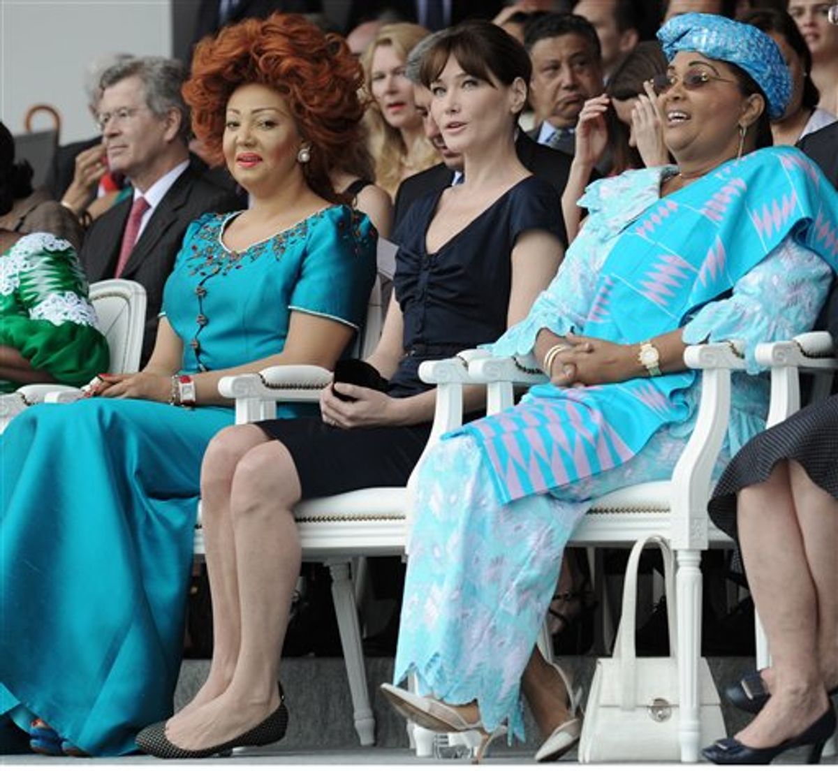 France First lady Carla Bruni-Sarkozy, center, flanked by Cameroon first lady Chantal Biya, left, and Burkina Faso's Chantal Compaore attend the annual Bastille Day military parade in Paris, Wednesday, July 14, 2010.  (AP Photo/Eric Feferberg, Pool)         (AP)