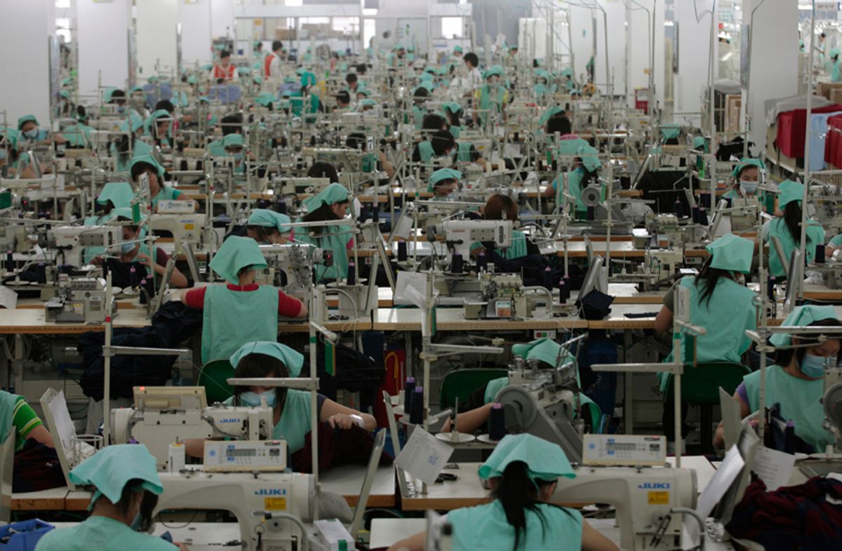 Employees of Luen Thai, an apparel and fashion service provider, work at a production line in a factory in Dongguan, China's southern Guangdong province May 14,2010. REUTERS/Tyrone Siu (CHINA - Tags: BUSINESS)  (Â© Siu Chiu / Reuters)