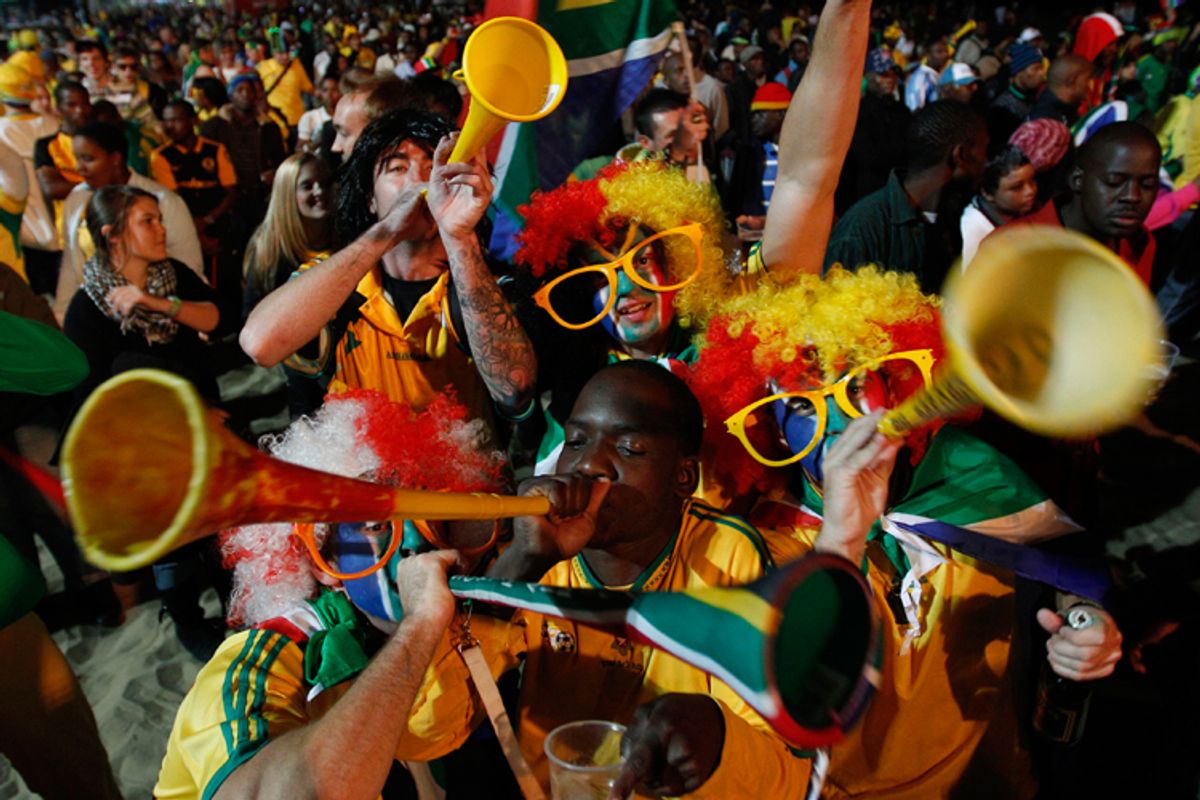 Fans blow their vuvuzelas as they cheer during the World Cup. Chinese media report that up to 90 percent of the vuvuzelas sold in South Africa during the World Cup were made in China.   