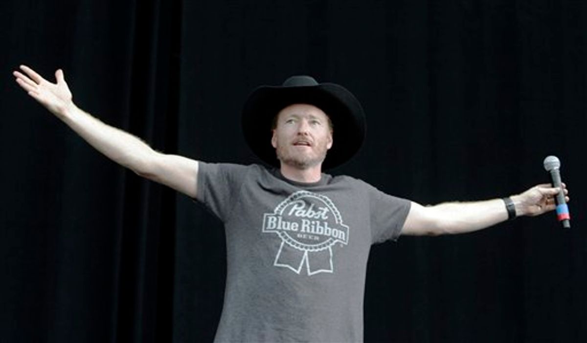 Comedian Conan O'Brien appears on stage at the Bonnaroo Music and Arts Festival in Manchester, Tenn. Saturday, June 12, 2010.  (AP Photo/Jeff Christensen)   (AP)