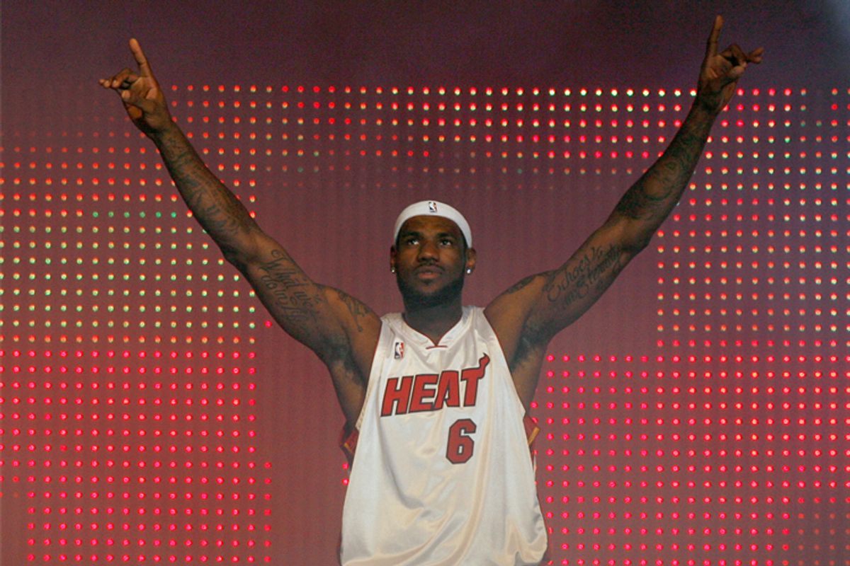 LeBron James greets fans at the Miami Heat's 'HEAT Summer of 2010 Welcome Event'  in Miami on Saturday. 