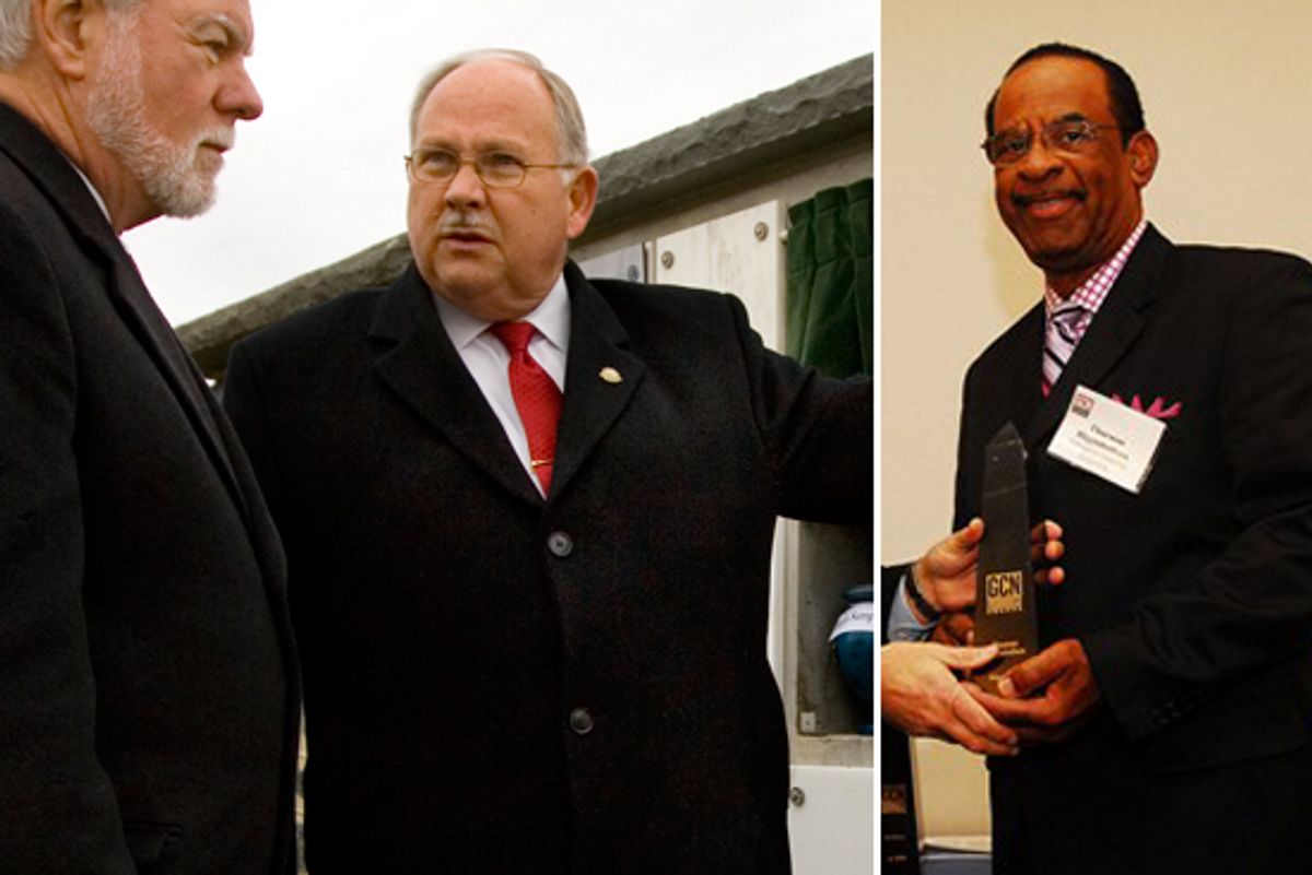 John C. Metzler, left, with Army Undersecretary Nelson M. Ford in December 2008, and Thurman Higginbotham, right