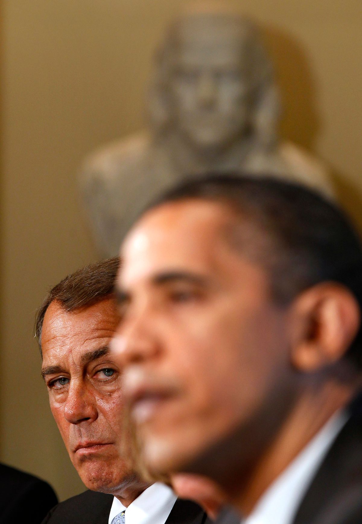House Republican Leader John Boehner (L) watches as U.S. President Barack Obama meets with Congressional bi-partisan leaders in the Cabinet Room of the White House in Washington June 10, 2010.      REUTERS/Larry Downing (UNITED STATES - Tags: POLITICS) (Â© Larry Downing / Reuters)