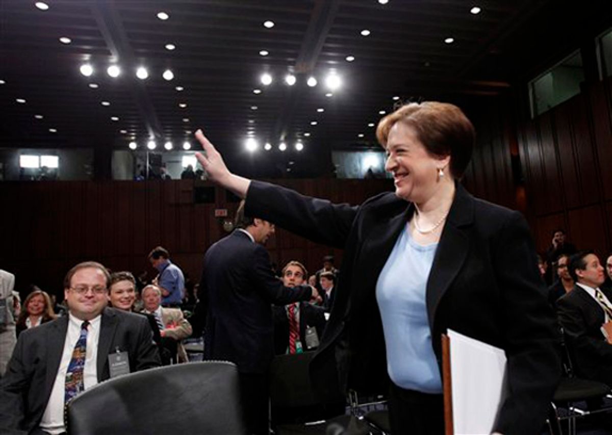 Supreme Court nominee Elena Kagan waves prior to taking her seat on Capitol Hill in Washington, Wednesday, June 30, 2010, prior to testifying before the Senate Judiciary Committee hearing on her nomination. (AP Photo/Alex Brandon) (Alex Brandon)