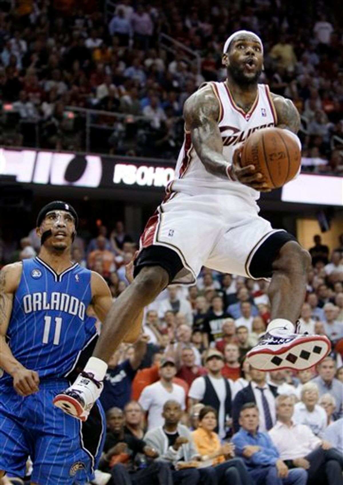 FILE - This May 28, 2009, file photo shows Cleveland Cavaliers' LeBron James getting inside Orlando Magic's Courtney Lee (11) for a shot in the third quarter of Game 5 of the NBA Eastern Conference basketball finals, in Cleveland.  On Tuesday night, July 6, 2010, ESPN reported that James will announce where he'll play next season during a one-hour TV special. James' publicist is expected to release a statement later Wednesday. (AP Photo/Amy Sancetta, File) (AP)