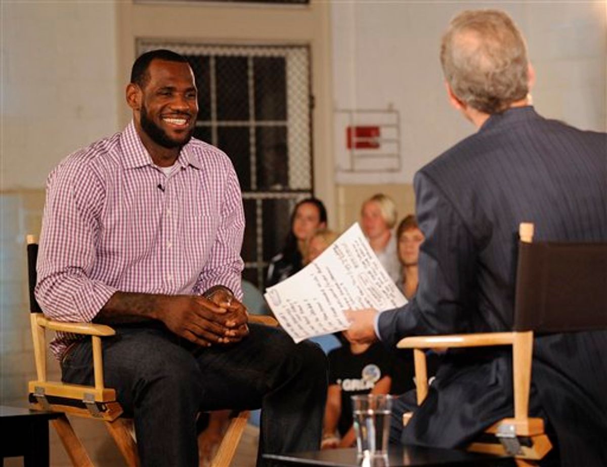 In a photo provided by ESPN, LeBron James sits with Jim Gray before an interview on ESPN on Thursday, July 8, 2010, in Greenwich, Conn. James said that he's decided to join the Miami Heat and leave the Cleveland Cavaliers after an unsuccessful seven-year quest for the championship he covets. (AP Photo/ESPN, Rich Arden) NO SALES   (AP)