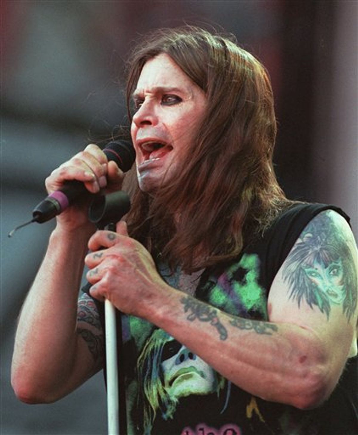 FILE - In this June 15, 1997 file photo, Ozzy Osbourne performs with Black Sabbath during the Ozzfest concert at the Meadowlands in East Rutherford, N.J. (AP Photo/Bill Kostroun, file)   (AP)