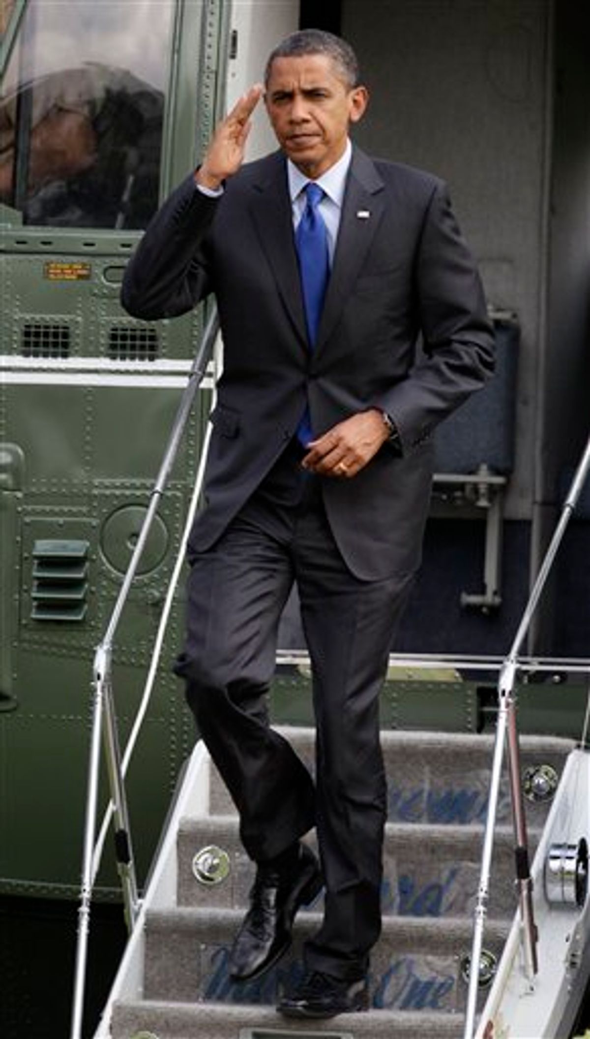 President Barack Obama salutes as he steps off of Marine One on the South Lawn of the White House in Washington, Saturday, July 10, 2010. (AP Photo/Carolyn Kaster) (AP)