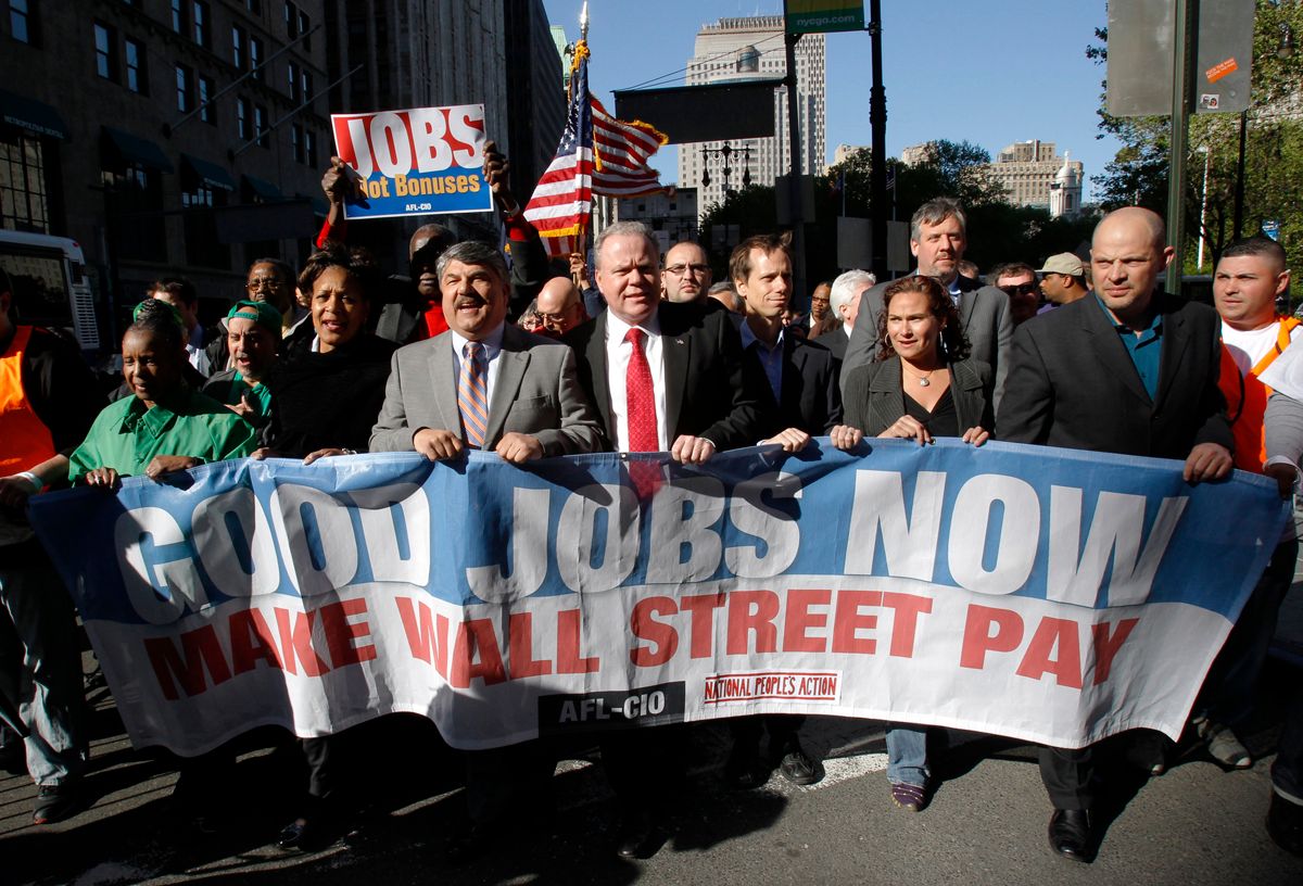 AFL-CIO President Richard Trumka (3rd L) marches with Jack Ahern, President of the NYC Central Labor Council (3rd R) and other leaders at the head of the "Main Street to Wall Street" rally in New York, April 29, 2010. The AFL-CIO and other labor and community groups marched down Broadway through the financial district to protest against Wall Street banks.   REUTERS/Mike Segar   (UNITED STATES - Tags: BUSINESS CIVIL UNREST)   (Â© Mike Segar / Reuters)