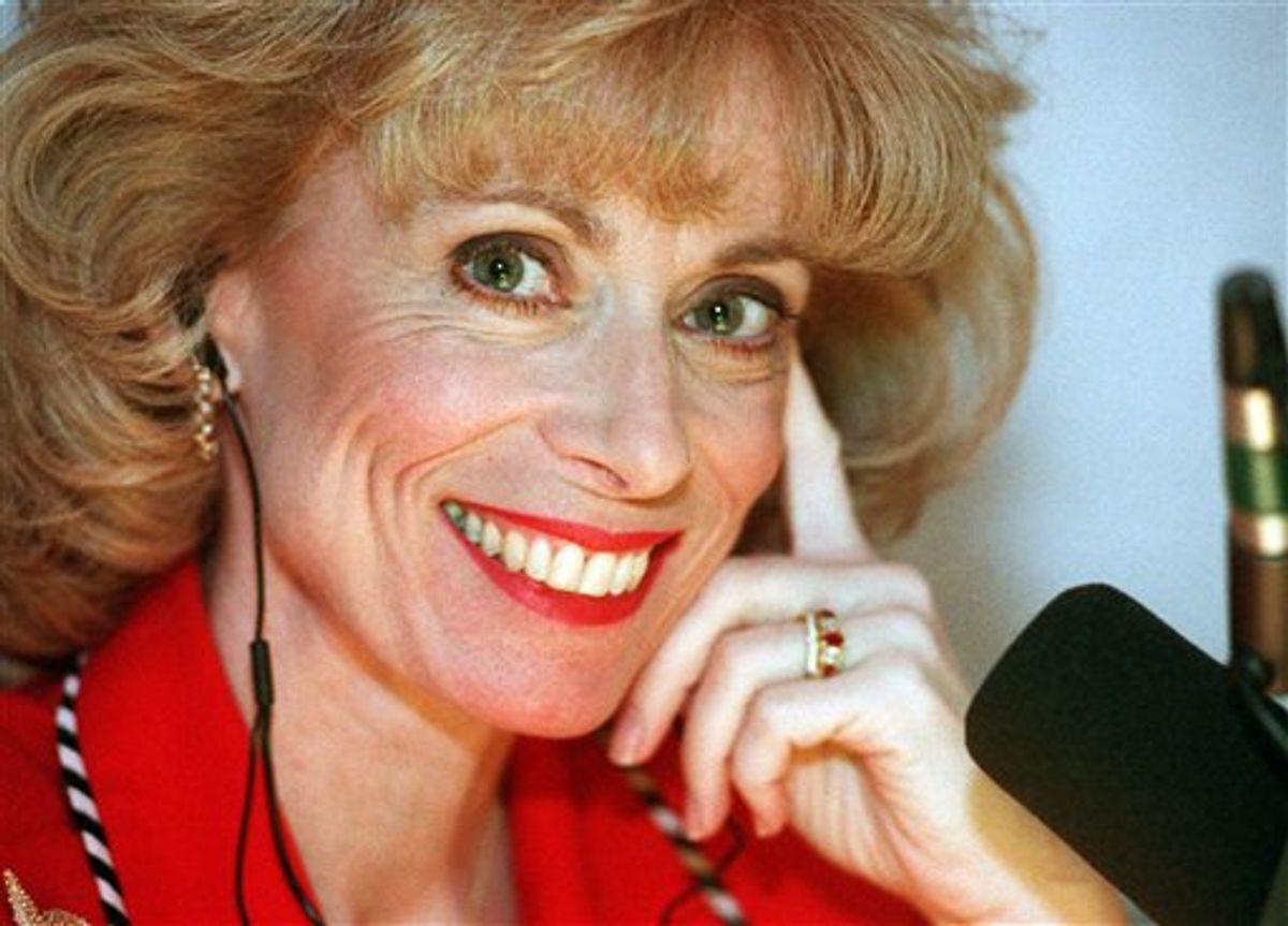 FILE - This Feb. 17, 1998 file photo shows Dr. Laura Schlessinger posing during her morning talk show in her Los Angeles studio.  Schlessinger is apologizing for blurting a racial slur several times during her talk show, Aug. 10, 2010. Schlessinger wrote on her Web site that she was wrong to utter the N-word. (AP Photo/Susan Sterner, File) (AP)