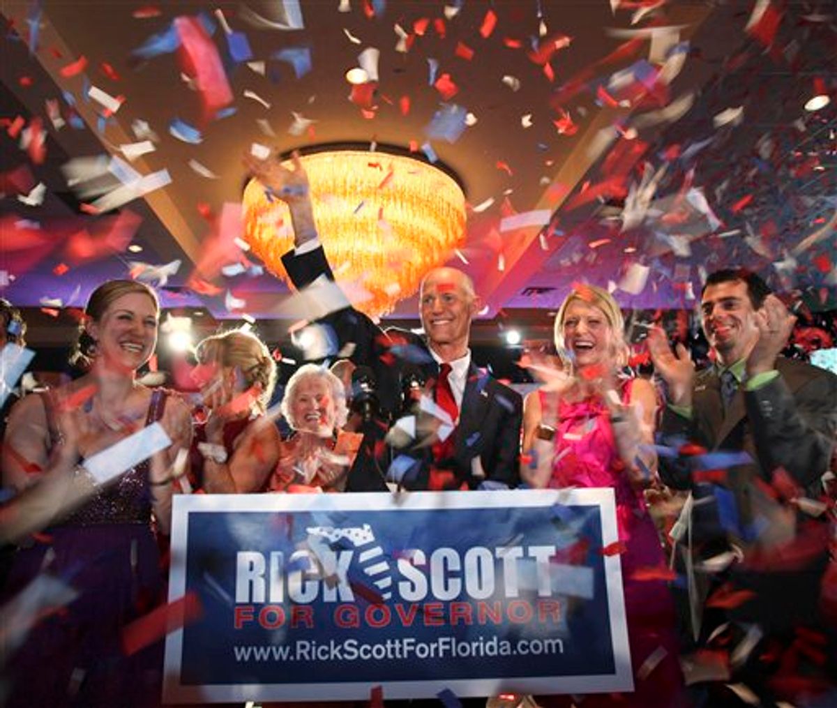 Surrounded by family, Republican gubernatorial candidate Rick Scott celebrates with supporters Tuesday, Aug. 24, 2010, in Fort Lauderdale, Fla. Florida's Republican voters chose Scott over career public servant Bill McCollum as their candidate for governor. (AP Photo/Wilfredo Lee) (AP)
