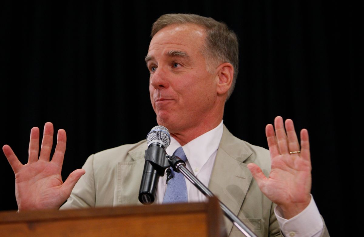 Former Vermont Gov. Howard Dean gestures as he answers a question at a town hall style meeting on health care reform hosted by Dean and Rep. Jim Moran, D-Va., at South Lakes High School in Reston, Va., Tuesday, Aug. 25, 2009.(AP Photo/Charles Dharapak) (Associated Press)